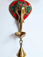 Brass Ganesha wall hanging with diya and bell, 11 inch