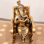 Swinging Ganapathi on a rocking chair.
