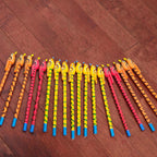 Wooden pencils with painted animal and bird toppers for kids