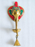 Brass Ganesha wall hanging with diya and bell, 11 inch