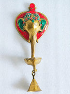 Brass Ganesha wall hanging with diya and bell, 11 inch