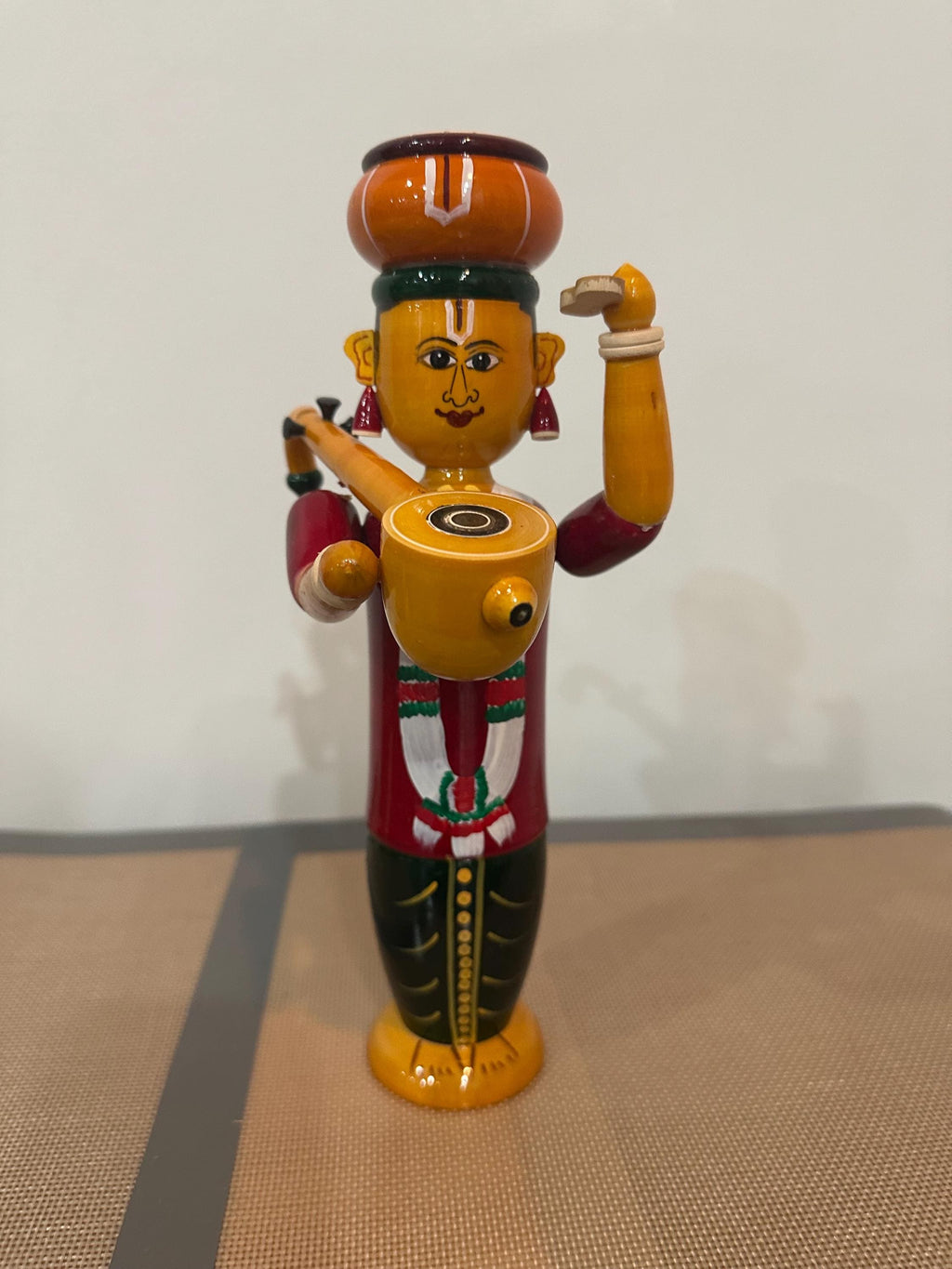Sankranti Haridasu made of wood.